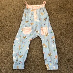 BABY BODEN LONG JUMPSUIT WITH ANIMALS ON IT.